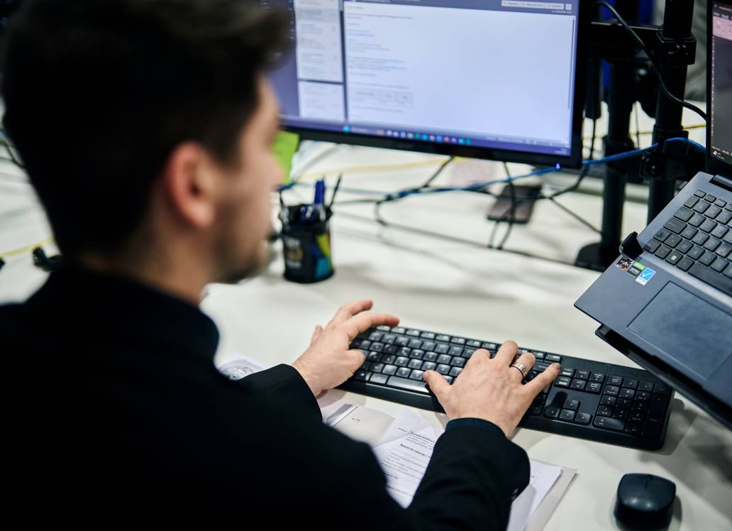 Man on the computer at his desk